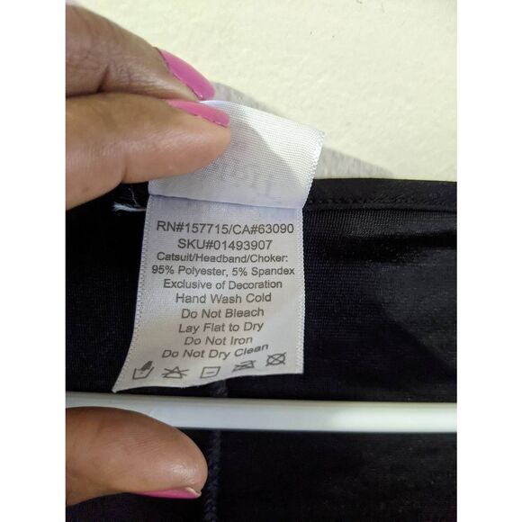 Spirit Halloween Black Onepiece Catsuit Costume with Attached Tail Adult Size XS - Picture 9 of 12